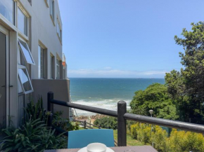 Escape to an Umdloti Beach Condo with a Communal Pool & Braai Area